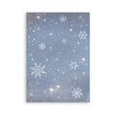 Festive paper with snowflakes and stars on a blue background