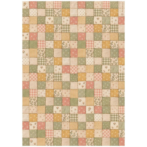 A square patchwork quilt pattern featuring a grid of small fabric squares in muted tones of sage green, dusty pink, mustard yellow, and cream, with various patterns including gingham, stripes, florals, and dots.