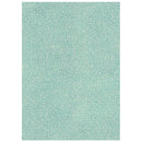 A rectangular area rug with a light mint green base and a dense, all-over pattern of small white dots, shown flat against a white background.