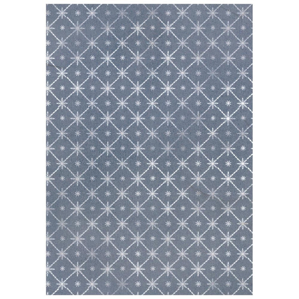 Patterned rug with white geometric design on a blue background