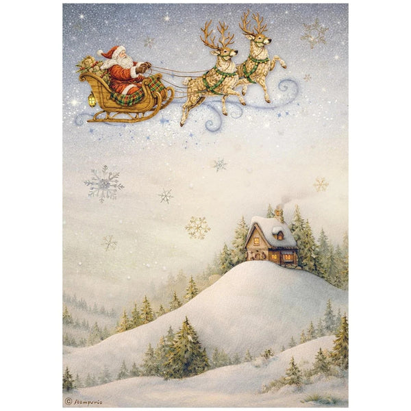 Santa Claus in a sleigh pulled by reindeer flying over a snowy landscape with a cabin.