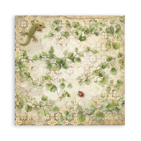 Decorative paper with green leaves, a lizard, and a ladybug on a textured background