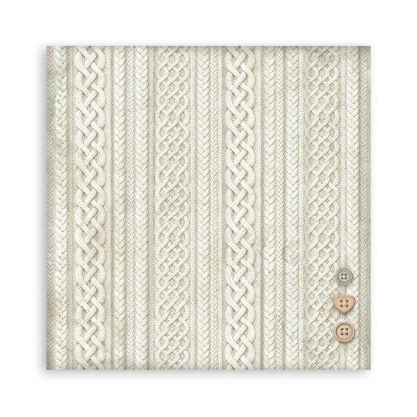 A square fabric or wallpaper sample featuring vertical cable-knit and chevron knit patterns in cream and off-white, with three decorative buttons on the lower right side, shown against a plain white background.
