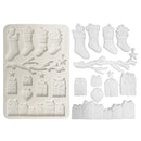 Silicone mold with Christmas-themed cavities on a white background