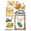 A collection of vintage-style decorative stickers or craft embellishments on a white background, including autumn leaves, a butterfly inside an ornate frame, cursive text reading 'L'Amour' and 'Love', floral elements, and textured paper pieces.