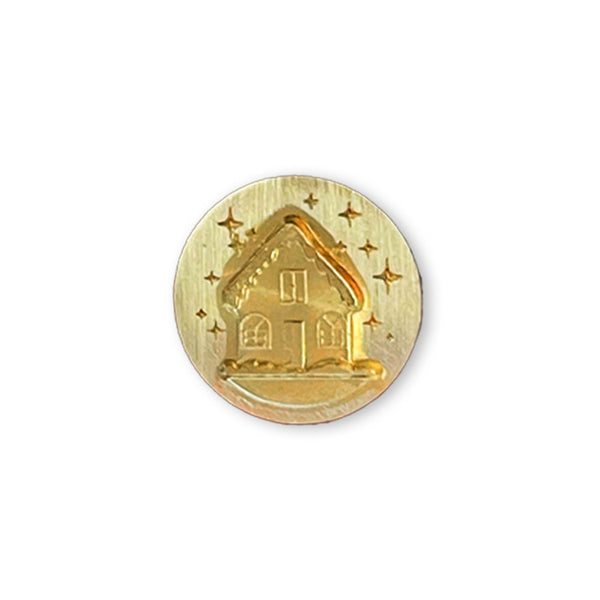 Gold coin with house design on a white background