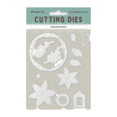 A package of Stamperia Christmas Wreath cutting dies, featuring multiple white metal die shapes on a light beige backing card with a teal header.