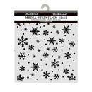 A packaged clear plastic media stencil with black snowflake and dot cutout patterns, shown hanging against a white background. The header card reads 'Stamperia' and 'Media Stencil CM 12x12'.