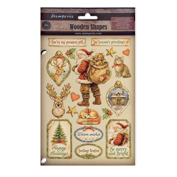 Stamperia wooden shapes sticker sheet featuring Christmas-themed illustrations including Santa Claus, reindeer, a cat, ornaments, and holiday phrases on a beige background.