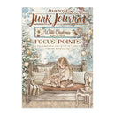 A stampers brand 'Junk Journal' art journal cover titled 'White Christmas'. The cover features a vintage illustration of a young girl sitting on a wooden bench next to a sleeping deer, with a decorated Christmas tree, ornaments, and a small table in the background.