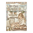 A package of Jamie Perro mini Rice Paper featuring a winter Christmas illustration of a young girl sitting on a couch with a sleeping deer, surrounded by cozy pillows and blankets.