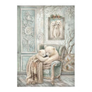 A framed art print depicting two white polar bear cubs cuddling on a vintage armchair draped with a cream knit blanket, set against a detailed pale blue and beige winter-themed room background.