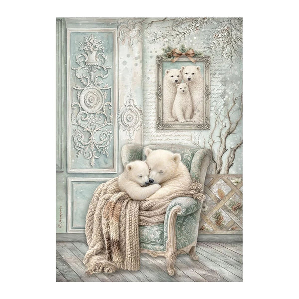 A framed art print depicting two white polar bear cubs cuddling on a vintage armchair draped with a cream knit blanket, set against a detailed pale blue and beige winter-themed room background.