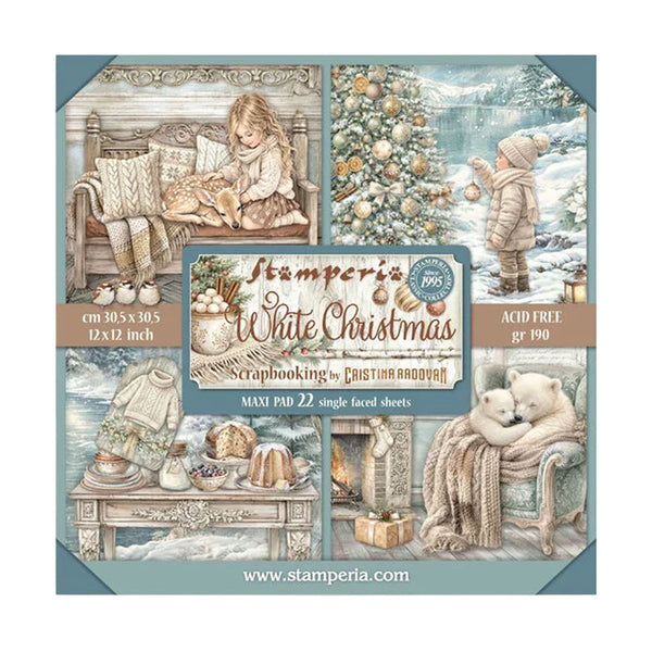 A square product card for Stamperia White Christmas acid-free paper sheets, showing a collage of vintage Christmas illustrations including a girl reading by a fire, a child in a snowy landscape, a decorated Christmas tree, and polar bears by a fireplace. Text on the card lists dimensions 30.