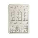 A rectangular white silicone mold with embossed architectural designs of European-style buildings, stars, a crescent moon, and small decorative motifs, shown on a plain white background.