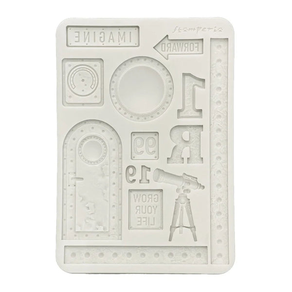 Silicone mold with various shapes and text on a white background