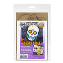Stampeders Anonymous 'Ornamentals' Sugar Skull kit in its original clear plastic packaging, featuring a brown cardboard backing and a colorful printed insert with sugar skull designs.