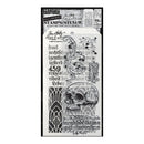 A Tim Holtz Collection Halloween Stamper Stencil sheet featuring a skull, gothic lettering, spiderweb pattern, and ornate scroll designs on a white backing card.