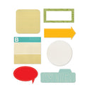 A set of seven decorative paper craft or scrapbook shapes on a plain white background, including a yellow rounded square, a green patterned label frame, a yellow arrow, a teal and cream striped label with a letter B, a white circular chevron pattern piece, and a red speech bubble.