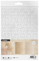 Studio Light White Paper sheet in a clear plastic hanging package, showing a subtle diamond pattern on the top sheet and three sample patterned sheets along the bottom.