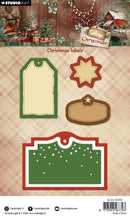 Set of Christmas-themed labels on a patterned background with Studio Light branding.