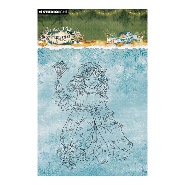 Studio Light Christmas Craze stamp set featuring a line-art illustration of a girl in a flowing dress holding a lantern, set against a light blue snowflake patterned background.
