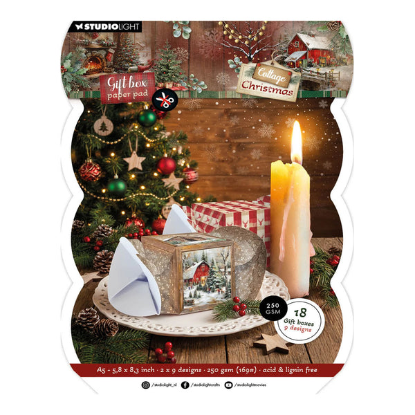 Studio Light Christmas gift box paper pad packaging, featuring 18 gift box designs with festive Christmas scenes, a candle, ornaments, and a decorated box on a white scalloped background.