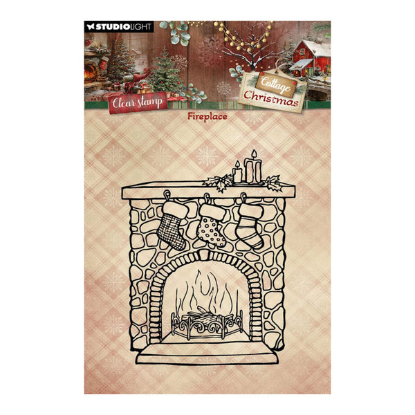 Studio Light Clear Stamp 'Collage Christmas Fireplace' stamp design, featuring a black line art illustration of a stone fireplace with stockings, candles, and a roaring fire, set against a warm beige plaid background with holiday collage elements at the top.