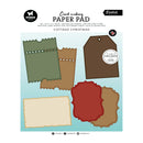 Card making paper pad cover featuring five sample paper cut shapes in olive green, tan, dark brown, red, and cream on a light blue background, with Studio 412 branding and the title 'Cottage Christmas'.