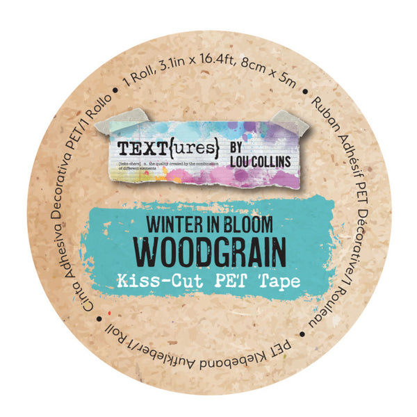 A round beige kraft-paper style label for Textures by Lou Collins Winter in Bloom Woodgrain Kiss-Cut PET Tape, featuring a turquoise paint-stroke design and product details printed around the edge.