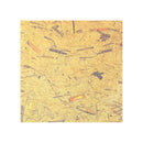 A square sample of textured gold-toned cardstock with scattered dark and warm orange flecks, centered on a white background.
