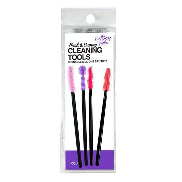 Gypsy Guitars 'Hook & Canny' Cleaning Tools set in clear plastic packaging, containing four reusable silicone brushes with black handles and pink, purple, red, and orange bristles.