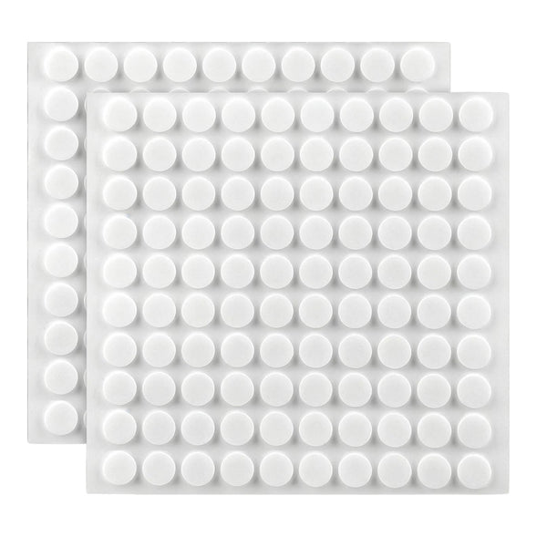 Two square white adhesive pads with rows of circular raised studs, shown overlapping on a plain white background.