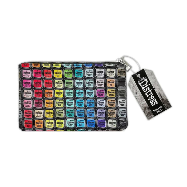 Pouch with colorful stamp pads and a ' distress' tag on a white background