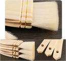 A set of light natural wood paint brushes with soft cream-colored bristles, shown in close-up detail views on a dark wood surface.