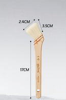 A wooden cosmetic brush with cream bristles, shown with overlaid dimension lines and labels indicating 2.4 cm, 3.