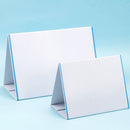 Two white triangular table cards or place cards with light blue edges, standing on a light blue background.