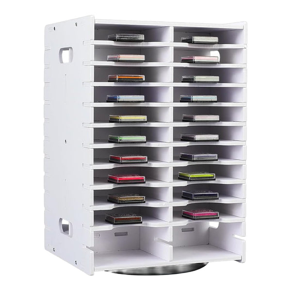 A white plastic cassette tape organizer rack with multiple horizontal shelves holding various cassette tapes, shown on a plain white background.