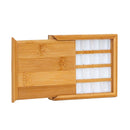 Bamboo tea tray with compartments on a white background