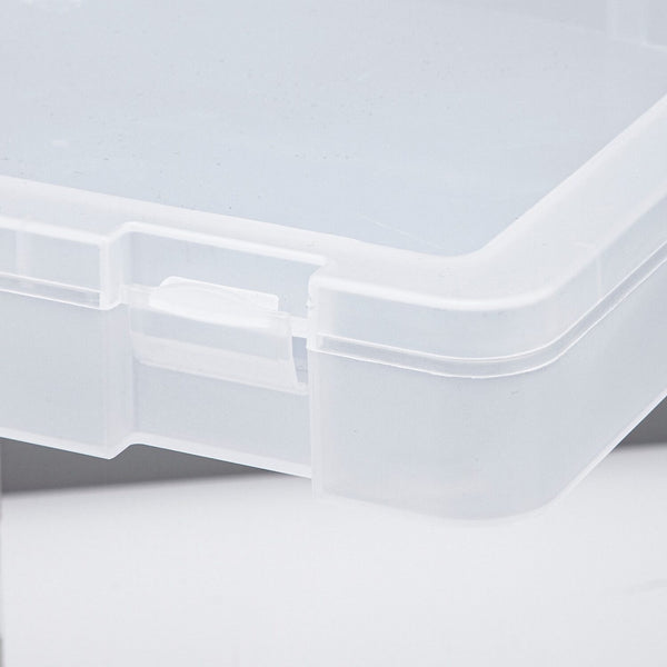 Clear plastic container on a light gray background