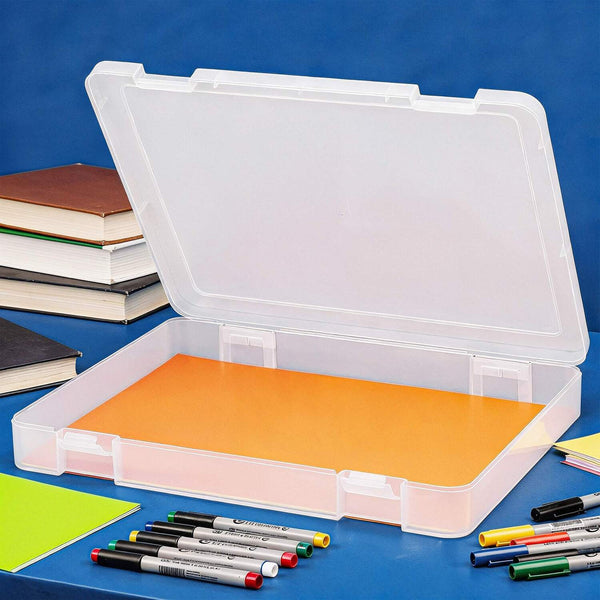 Clear plastic storage box with orange interior on a blue background with markers and books.