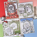 Four handmade Christmas greeting cards arranged in a flat lay on a colorful background with red, wood, blue, and green paper sheets and silver ornaments.