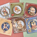 Six decorative square greeting cards with round illustrated holiday motifs are arranged on a split pink and mint green background. The card designs show winter animals and characters, including a rabbit, bird, Santa, reindeer, teddy bear, and penguin, with ornate borders and festive colors.