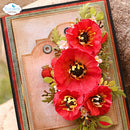 A close-up of a handmade paper craft card featuring layered beige arches, red poppy flowers with yellow centers, green leaves, and small decorative accents. The card is photographed outdoors against a blurred stone and grass background, with an Elizabeth craft designs logo in the top-left corner.