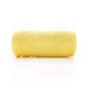 Yellow skein of yarn on a white background