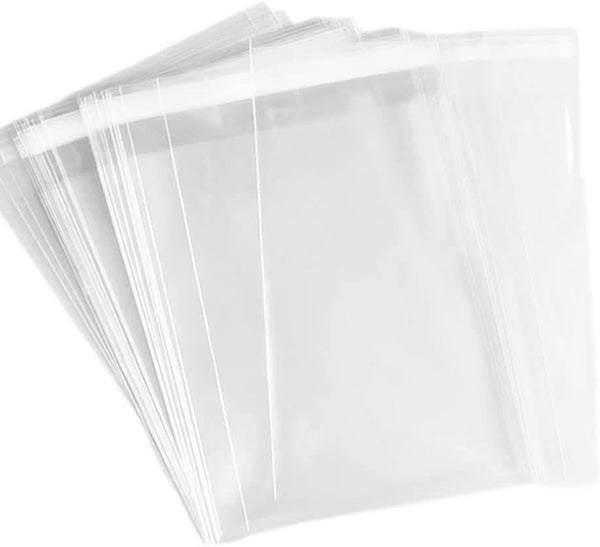 Clear plastic sheets stacked on a white background