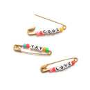 Jen Hadfield Reaching Out Metal Safety Pins - W/Phrase Beads